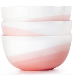 Painting ceramics with monochrome ombre glaze: White bowls with a gentle color gradient from delicate rose to vibrant pink in a minimalist design.