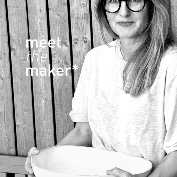 Potrait of Corinne Vontobel holding her ceramic forms.